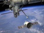 Artist's conception of SpaceX Dragon capsule berthing to the ISS (Credits: SpaceX).