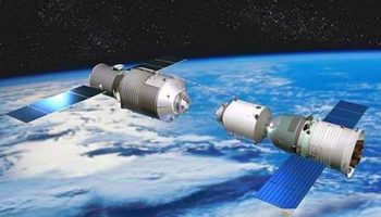 Artist's conception of the Tiangong-1 space station during rendezvous and docking with a Shenzhou spacecraft (Credit: Reuters).