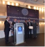 Ram Jakhu (right) receives the IAA award.