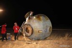 The Shenzhou-8 reentry capsule following its successful landing in Mongolia (Credits: Xinhua/Li Gang).
