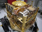 The Sample Analysis at Mars (SAM) instrument will analyze samples of material collected by the rover's arm. It is not expected to have trouble with teflon particles, but results may be skewed (Credits: NASA).