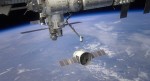 Rendition of Dragon approaching ISS (Credits: NASA/SpaceX).