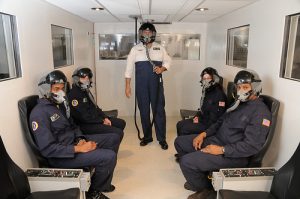 Companies like NASTAR aim to provide standardized training for suborbital spaceflight participants, but the curricula are anything but standardized. Pictured here, a NASTAR class in the altitude chamber (Credits: NASTAR Center).