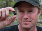 RObert Ward displays one of his finds, a 10 gram carbonaceous chondrite in Lotus, CA (Credits: AP/Rich Pedroncelli).