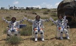 The Shenzhou 9 crew seated shortly after landing. The crew is no longer experiencing dizziness or the other sideeffects of microgravity (Credits: CCTV).