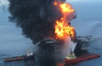 The BP Deepwater Horizon oil rig ablaze. - Credits: U.S. Coast Guard