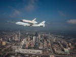 Endeavour flies over Houston aboard the Shuttle Carrier Aircraft. This photogrpah was captured by a NASA T-38 chase plane (Credits: NASA/Sheri Locke).