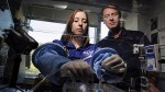 Jennifer Hayden and James Burgess work with the Aqueous Immersion Surgical System prototype prior to an upcoming parabolic flight test (Credits: Bill Wade/ Pittsburgh Post-Gazette).