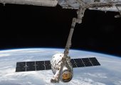 SpaceX's Dragon capsule and Candarm2, the robotic arm that will detach the capsule from the ISS (Credits: NASA).