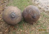 The first and third spheres found on the property of Dean Gentz and Trac Ellis, pictured side-by-side (Credits: Dean Gentz).