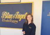 Abegael Jakey, outreach coordinator for NASA's Aviation Safety Reporting System, suits up for her special recognition flight with the Navy's Blue Angels. (Credits: NASA/Kevin Jakey).