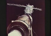 Although the deployment of the Apollo Telescope Mount (ATM), in the background, was considered relatively complex in terms of its criticality, no one could have foreseen that Skylab’s solar arrays and micrometeoroid shield would almost ruin the mission. In this view from Pete Conrad’s crew, the tattered wiring and tubing from the torn solar array are clearly visible (Credits: NASA).