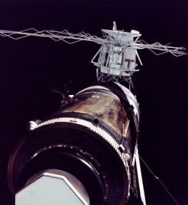 Skylab’s precarious condition is evident in this image from Pete Conrad’s crew, revealing the tubing and wiring from the torn solar array at middle left. For several days, power came from the “windmill” of arrays on the Apollo Telescope Mount (background) (Credits: NASA).