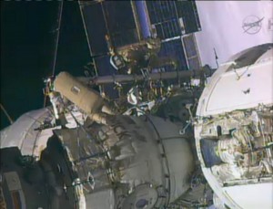 Yurchikhin and Misurkin translating on the Strela boom (Credits: NASA TV)