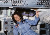 STS-7 Mission Specialist Sally Ride poses on aft flight deck with her back to the on orbit station (Credit: NASA).