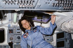 STS-7 Mission Specialist Sally Ride poses on aft flight deck with her back to the on orbit station (Credit: NASA).