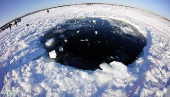 The biggest of seven major chunks that the celestial body fragmented into ended up in the local Chebarkul Lake (Credits: RT.com/RIA Novosti).