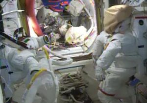 Spacesuits lay idle until a leak in Parmitano's suit, pictured left, can be found and resolved (Credits: NASA).