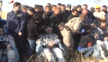 Cassidy, Vinogradov, and Misurkin just after extraction from their Soyuz TMA-08M (Credits: NASA TV).