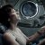 Gravity's Dr. Ryan Stone (Sandra Bullock) takes respite in a Soyuz (Credits: Warner Bros.).