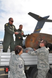 729th Airlift Squadron personnel from March Air Reserve Base, California, receive the Delta II Debris from US Embassy Mongolia, in Ulaanbaatar (Credits: Dan Reichel).