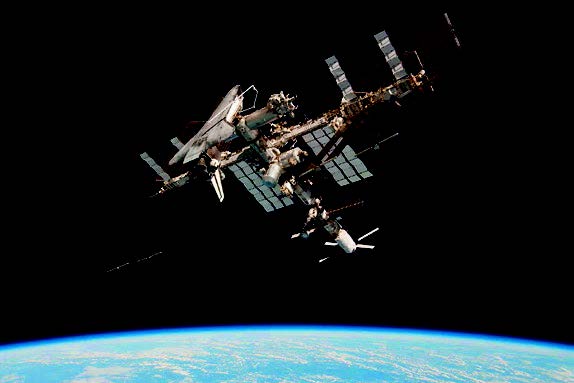 The ISS, pictured here with ATV Johannes Kepler and Shuttle Endeavour docked, is remarkable for both its technological and its diplomatic achievements, bringing together 15 nations including former archenemies US and Russia. – Credits: Paolo Nespoli/NASA