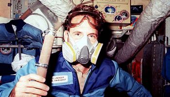 Astronaut Jerry Linenger wears a respirator mask following the 1997 fire aboard Mir. Credits: NASA