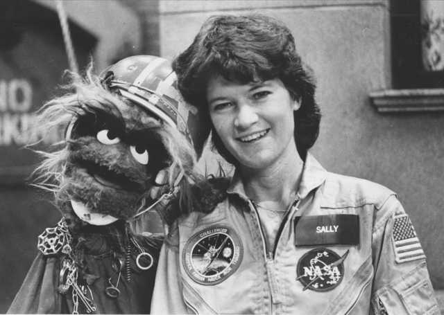 Ride made a point of reaching out to children, especially girls, as when seen here appearing on the television show Sesame Street in 1984 (Credits: Dave Pickoff/AP).