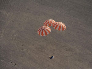 A July 2012 Orion drop test, using all three parachutes (Credits: NASA).