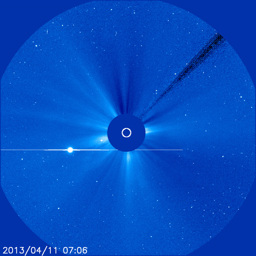 SOHO captured this view of the April 11 coronal mass ejection passing in front of Mars and Venus and speckling its coronograph with energetic solar protons (Credits: NASA/SpaceWeather.com).