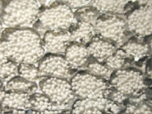 Amine-based filter beads in Thermally Conductive Metal Foam (Credits: NASA).