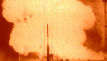 The explosion of the R-16's first stage fuel supply fed a ferocious fire (Credits: USSR).