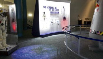 The travelling Red Bull Stratos Exhibit featuring Baumgartner's pressure suit and capsule (Credits: Red Bull Stratos).