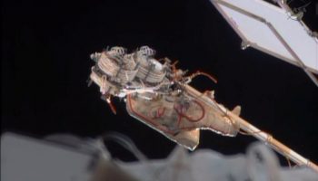 Yurchikhin rides the Strela boom during his record breaking EVA (Credits: NASA).