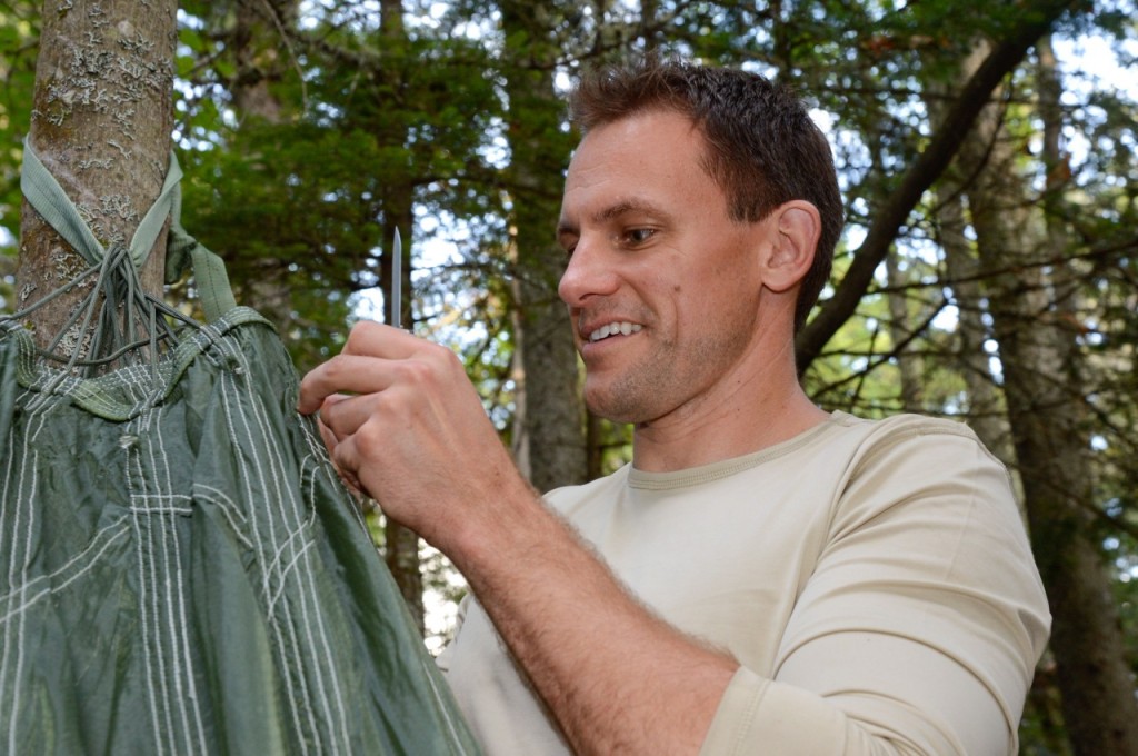 Pictured above, astronaut candidate Josh Cassada engages in wilderness survival training in Maine (Photo credit NASA).
