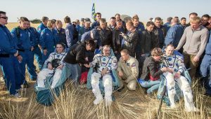 Christopher Cassidy, Pavel Vinogradov, and Alexander Misurkin rest after landing in a malfunctioning Soyuz TMA-08M (Credits: NASA).