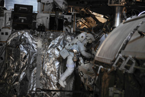 Luca Parmitano works on the routing of data and Ethernet cables during the short-lived 16 July EVA (Credits: NASA).