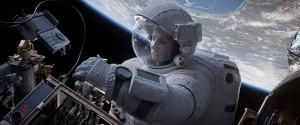 Ryan Stone (Sandra Bullock) works on Hubble in the movie "Gravity" (Credits: Warner Bros.).