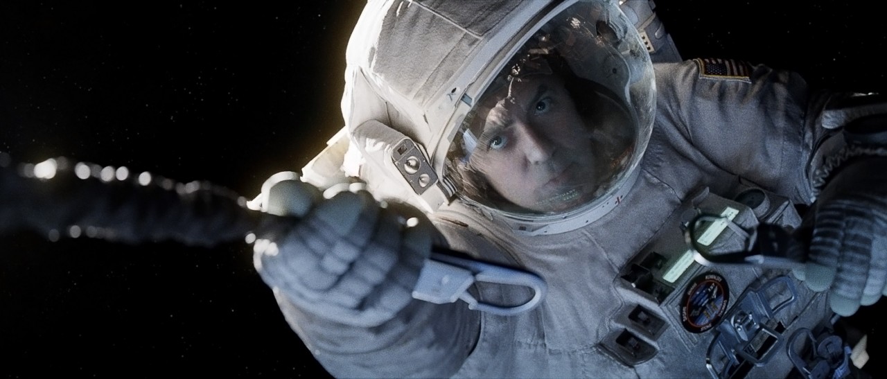 "Gravity" astornaut Matt Kowalski (George Clooney) releases his tether before floating off into space (Credits: Warner Bros.).