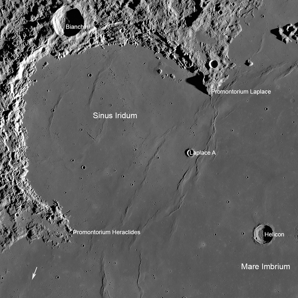 An annotated photograph of Chang’e 3′s landing site, taken by NASA’s Lunar Reconnaissance Orbiter. The arrow at lower left, shows the location of the Soviet Lunokhod 1 rover (Credits: NASA/GSFC/Arizona State University).