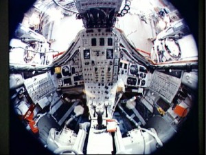 This fish-eye view of the interior of Gemini VII reveals the limited space available to Frank Borman and Jim Lovell during their 14-day mission. Within this cramped volume were not only the men themselves, but their food, experiments, cameras … and bags for their bodily wastes. Both astronauts likened it to living for two weeks in a men’s room (Credits: NASA).