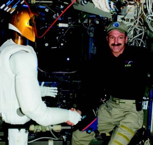 In 2011, Robonaut 2  began its mission assisting with tedious tasks aboard the International Space Station. In 2012 it was party to the first human-robot handshake in space, shared with Commander Dan Burbank (Credits: NASA).