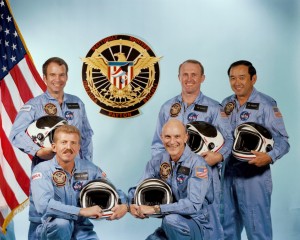 Since the conception of the manned spaceflight engineer programme, the intent was to fly a dedicated officer aboard each classified flight. For Mission 51C, it would be Air Force Major Gary Payton (back left). The other NASA crew members were Loren Shriver (front left) and Ken Mattingly (front right), with Jim Buchli and Ellison Onizuka behind (Credits: NASA).