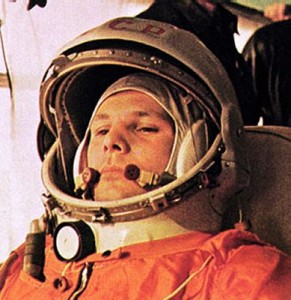 Clad in his orange space suit, Yuri Gagain appears pensive in this image recorded during his journey to the launch pad on 12 April 1961 (Credits: Roscosmos).
