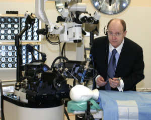 Dr. Garnette Sutherland with neuroArm (Credits: Ken Bendiktsen / University of Calgary)