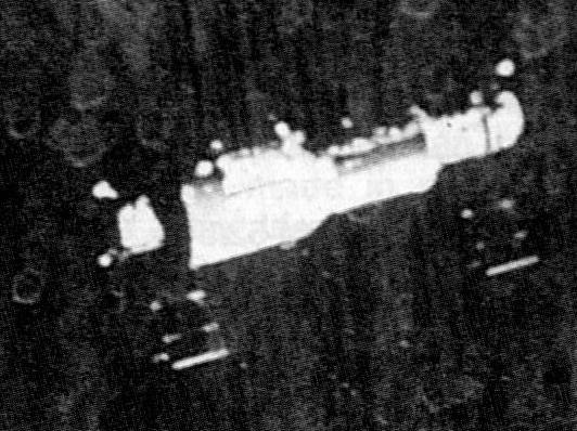 Grainy image from the departing Soyuz 11 mission in June 1971, showing Salyut 1. This was one of the last close-up views of the world’s first space station. Credits: Roscosmos.