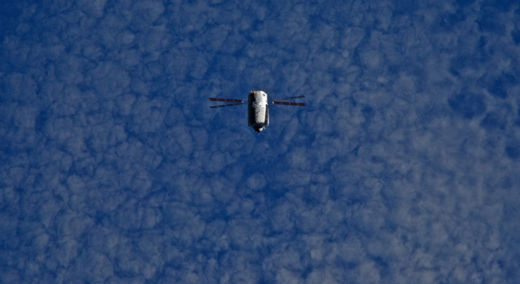 ATV flying under International Space Station, Credits: NASA/ESA